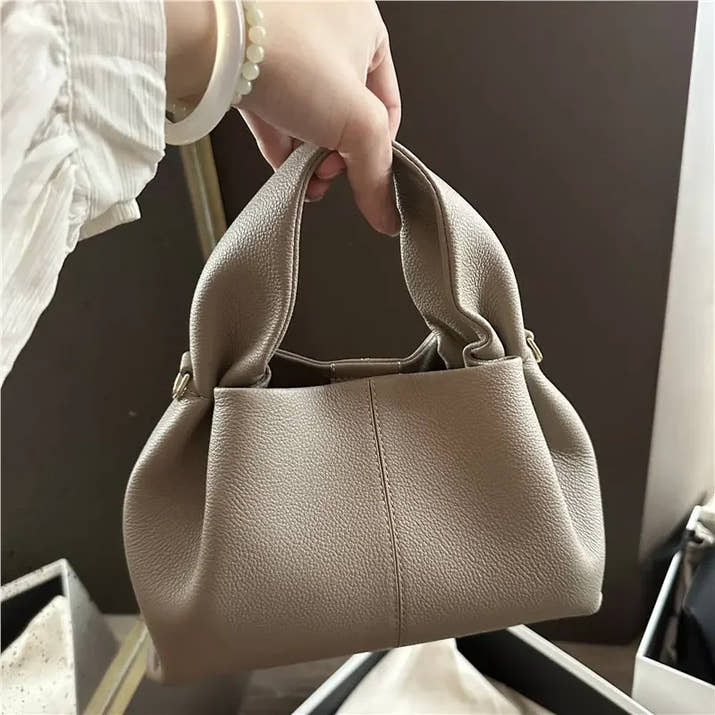Mini cloud bag, light luxury handheld crossbody bag, women's fashionable dumpling bag, makeup bag, cowhide storage bag