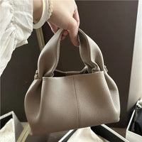 Mini cloud bag, light luxury handheld crossbody bag, women's fashionable dumpling bag, makeup bag, cowhide storage bag