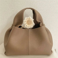 Mini cloud bag, light luxury handheld crossbody bag, women's fashionable dumpling bag, makeup bag, cowhide storage bag