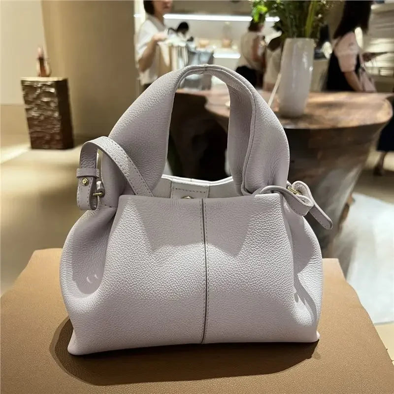Mini cloud bag, light luxury handheld crossbody bag, women's fashionable dumpling bag, makeup bag, cowhide storage bag